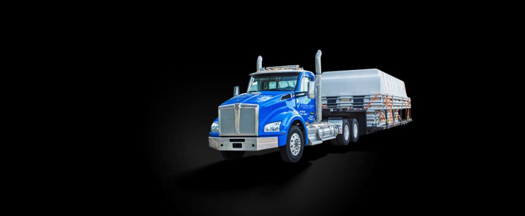 Leisure Pools fibreglass pools delivery with a truck