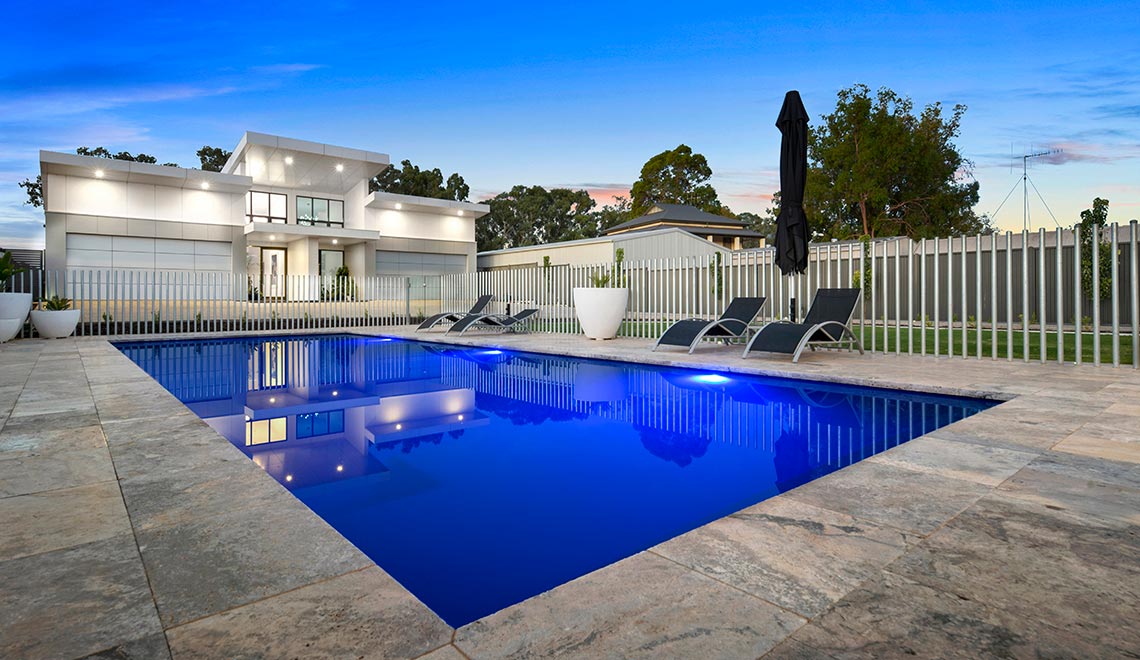 Leisure Pools Acclaim composite swimming pool in Sapphire Blue