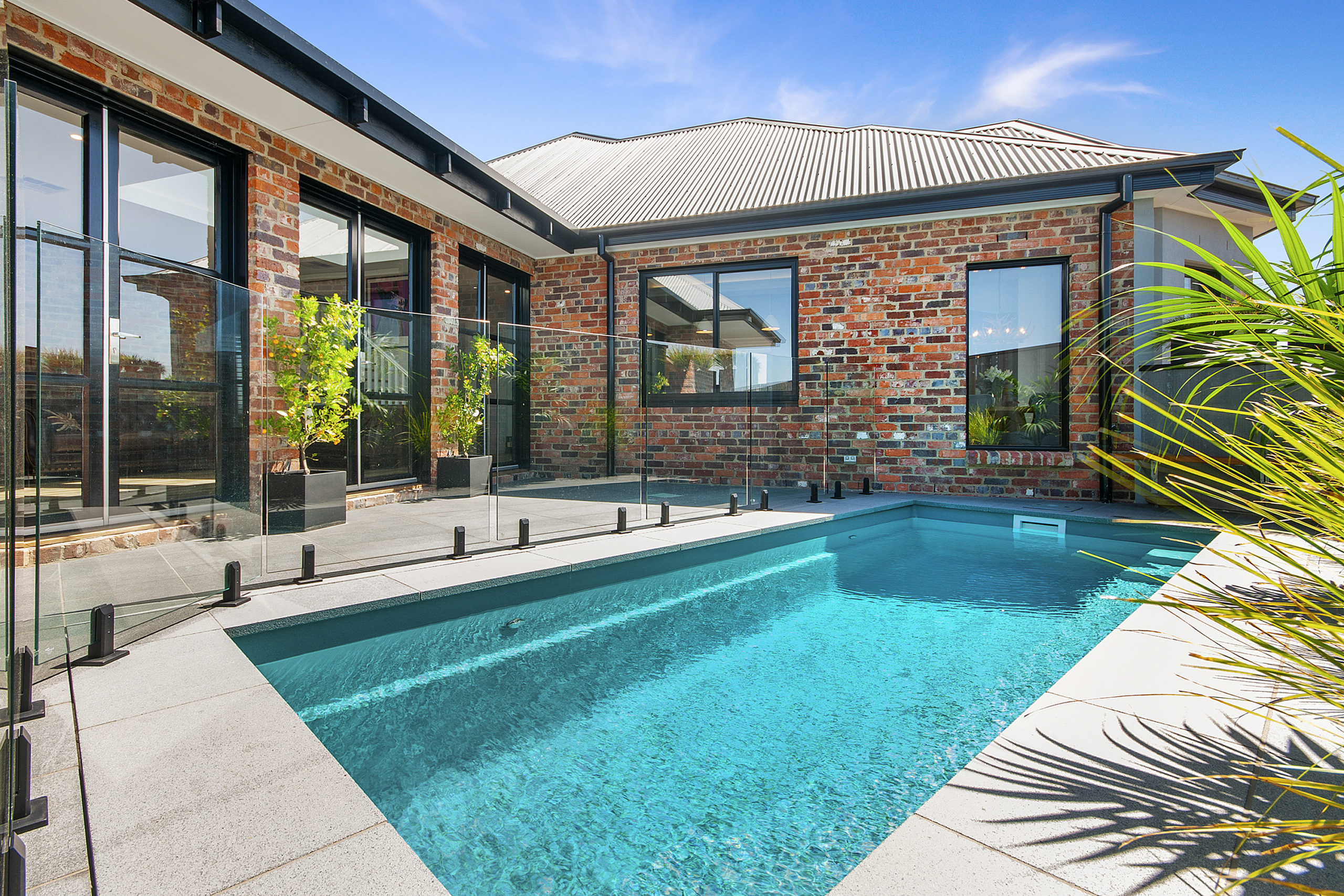 Leisure Pools Esprit fiberglass inground swimming pool