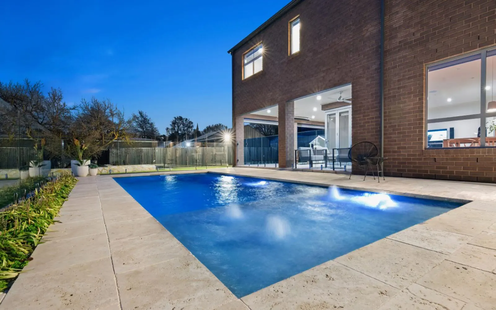 The Reflection fibreglass swimming pool with Splash Deck