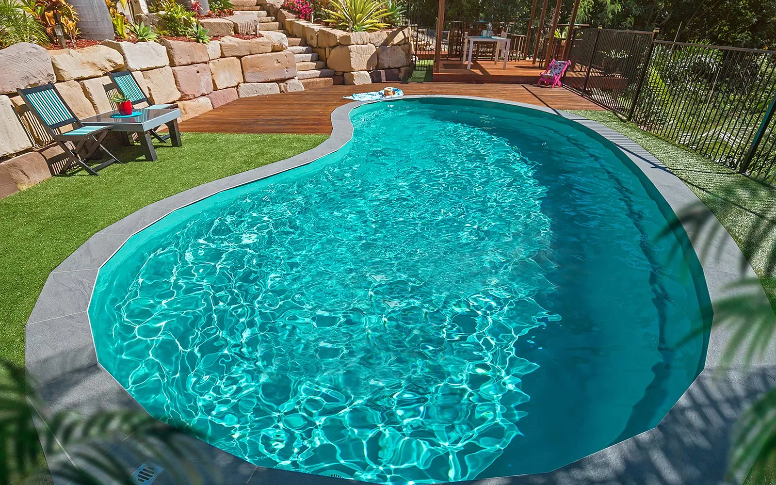 The Tuscany kidney-shaped fibreglass swimming pool