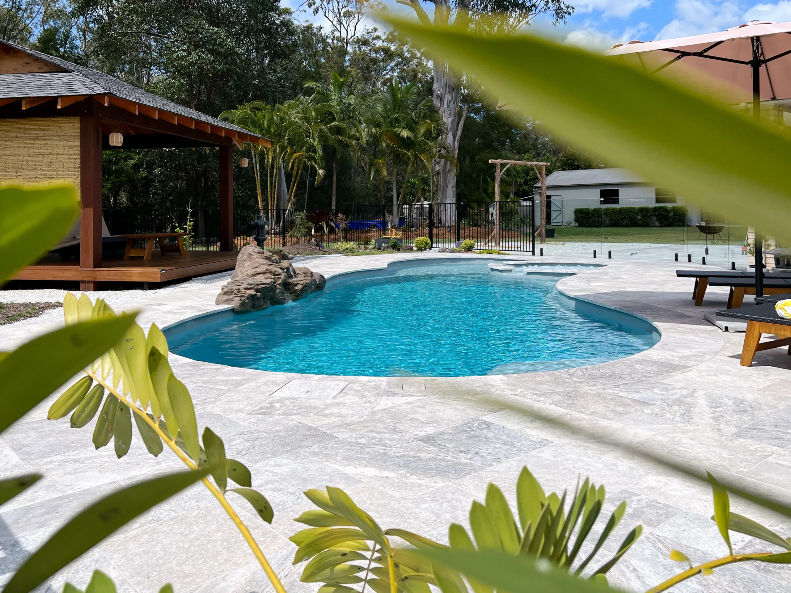 Silver Travertine Tiles around Sunshine Coast Pool