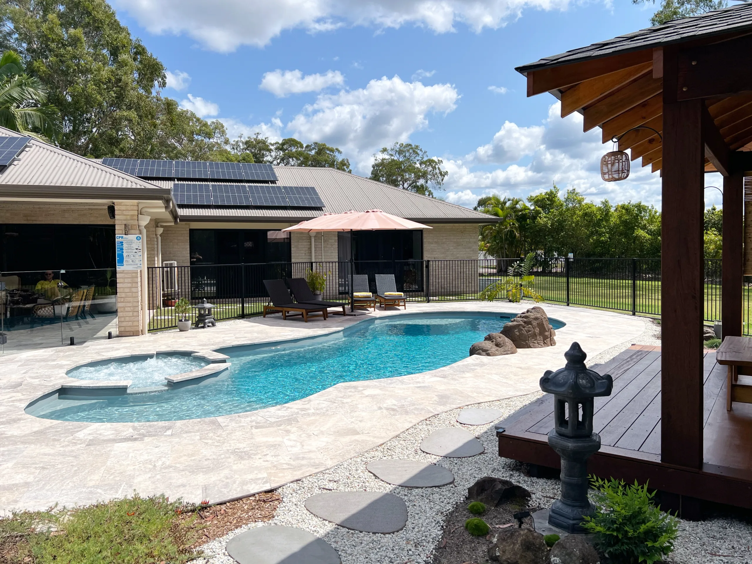 Silver Travertine Tiles around Sunshine Coast Pool