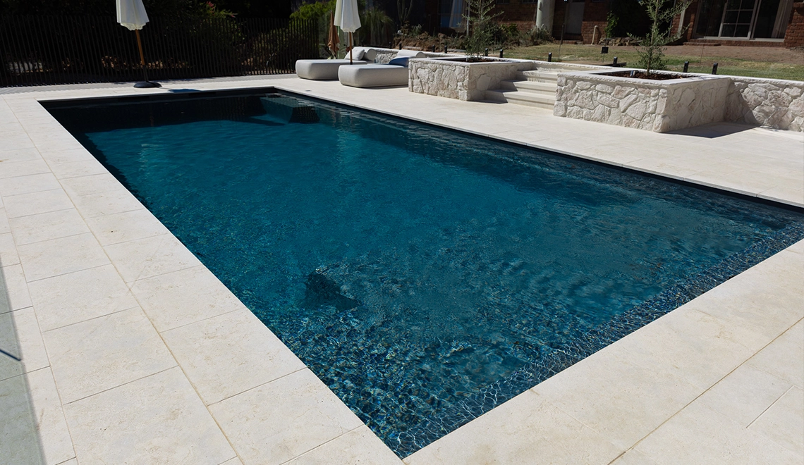 The Acclaim 10.15m in Graphite Grey installed by G.V. Unique Pools