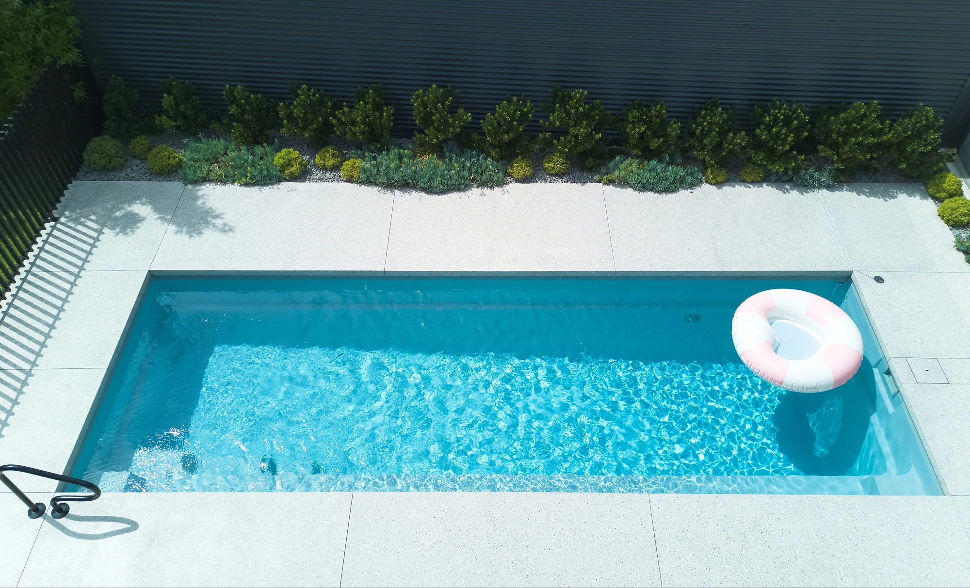 Leisure Pools Harmony fibreglass swimming pool in Crystal Blue