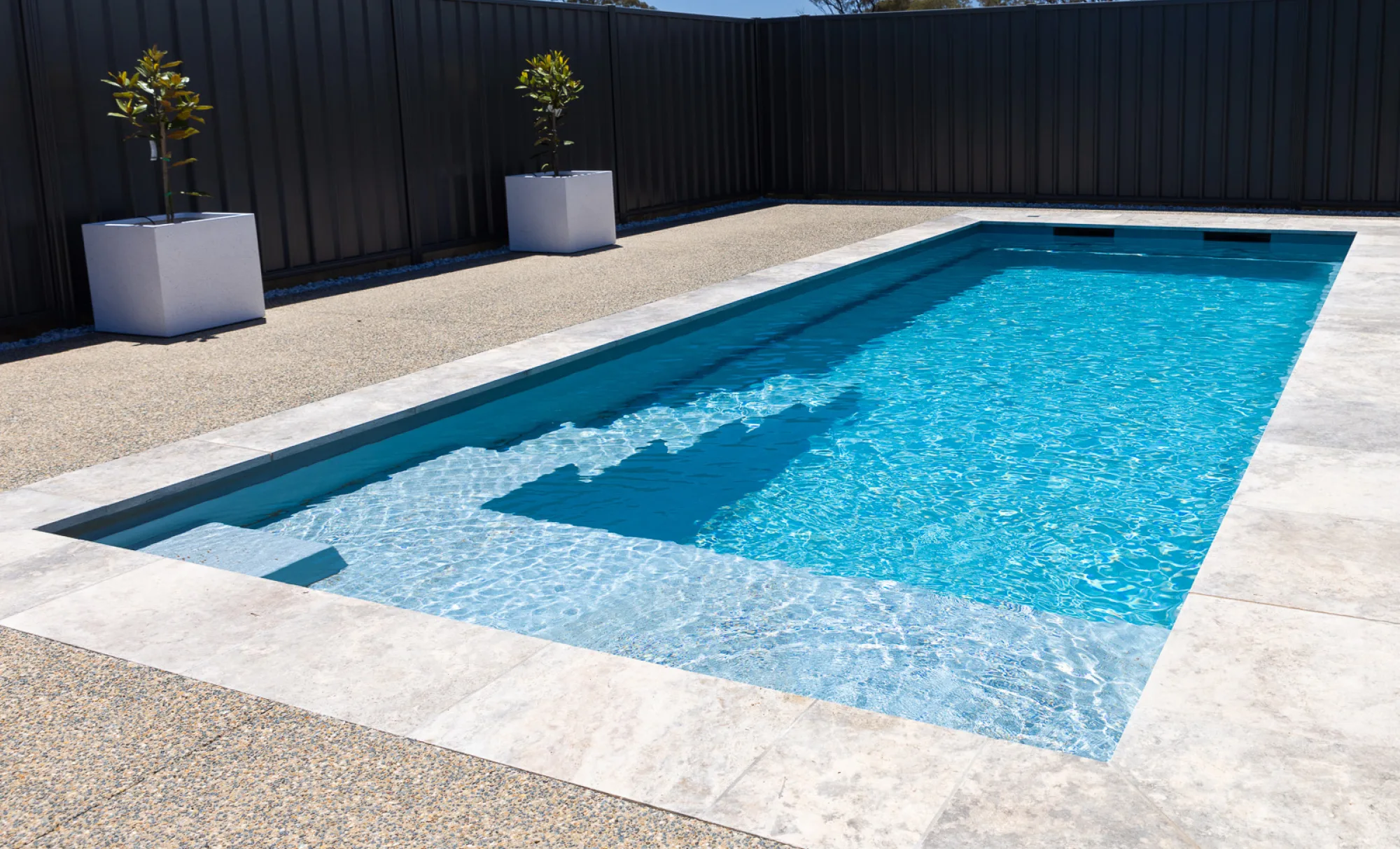 Leisure Pools Precision fibreglass swimming pool with high water line