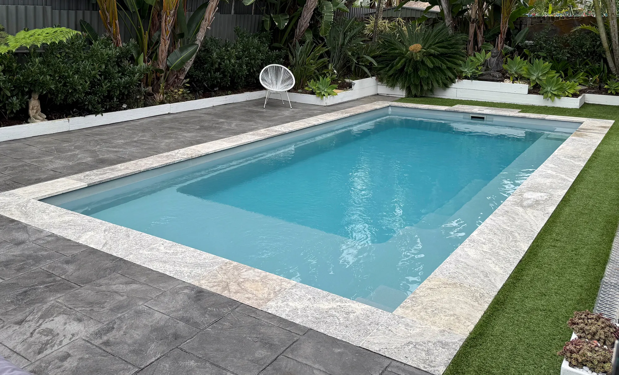 The Reflection fibreglass swimming pool with Splash Deck