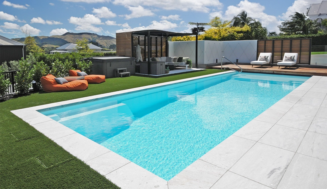 The Acclaim 12.15m in Shimmer White installed by NZ Pools