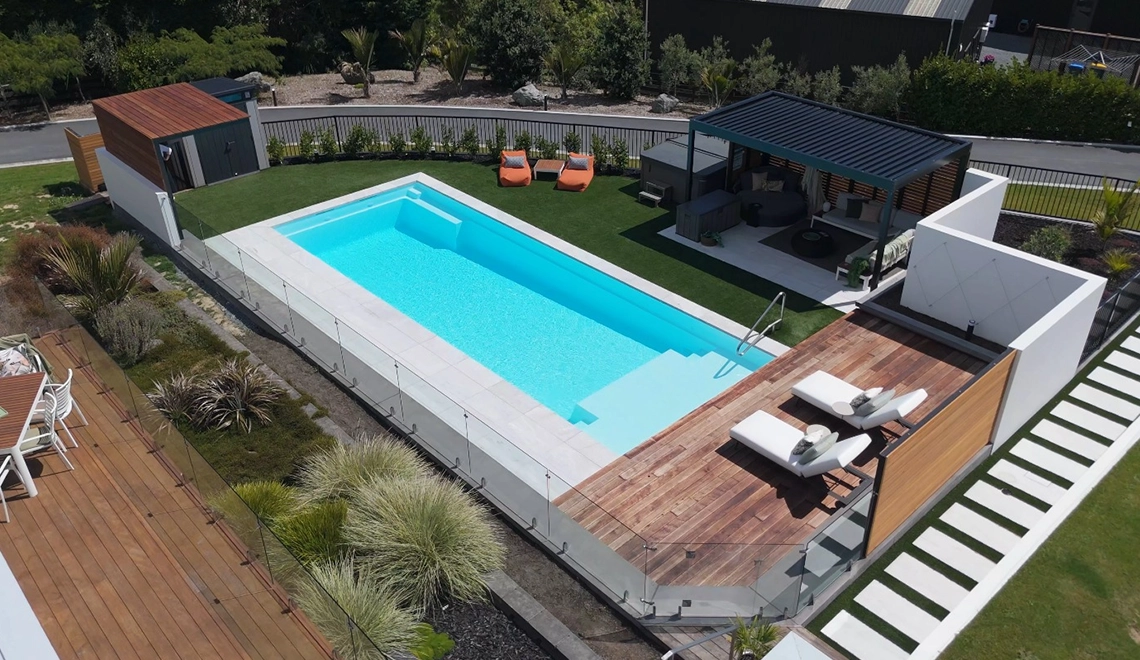 The Acclaim 12.15m in Shimmer White installed by NZ Pools