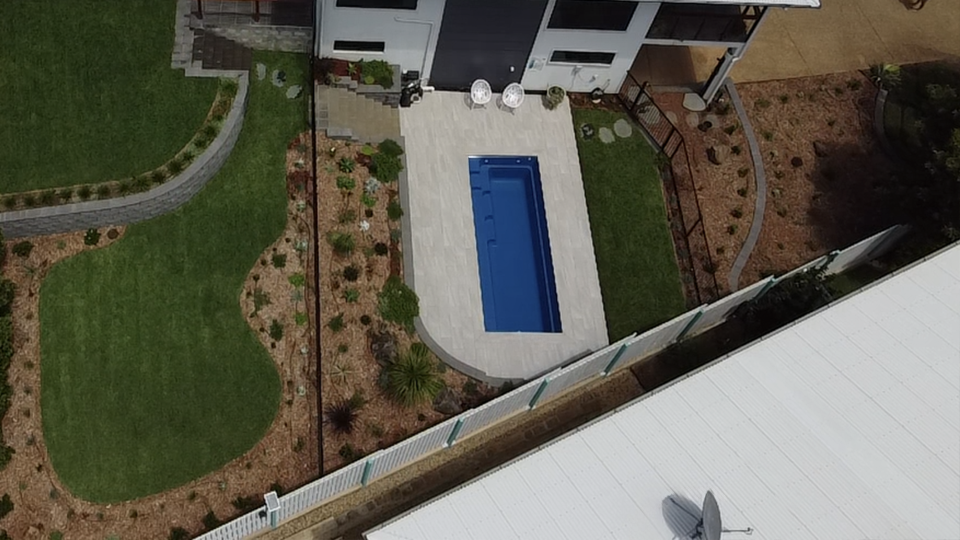 The Compact Pool: The Esprit 5.70m in Sapphire Blue installed by Leisure Pools Yeppoon