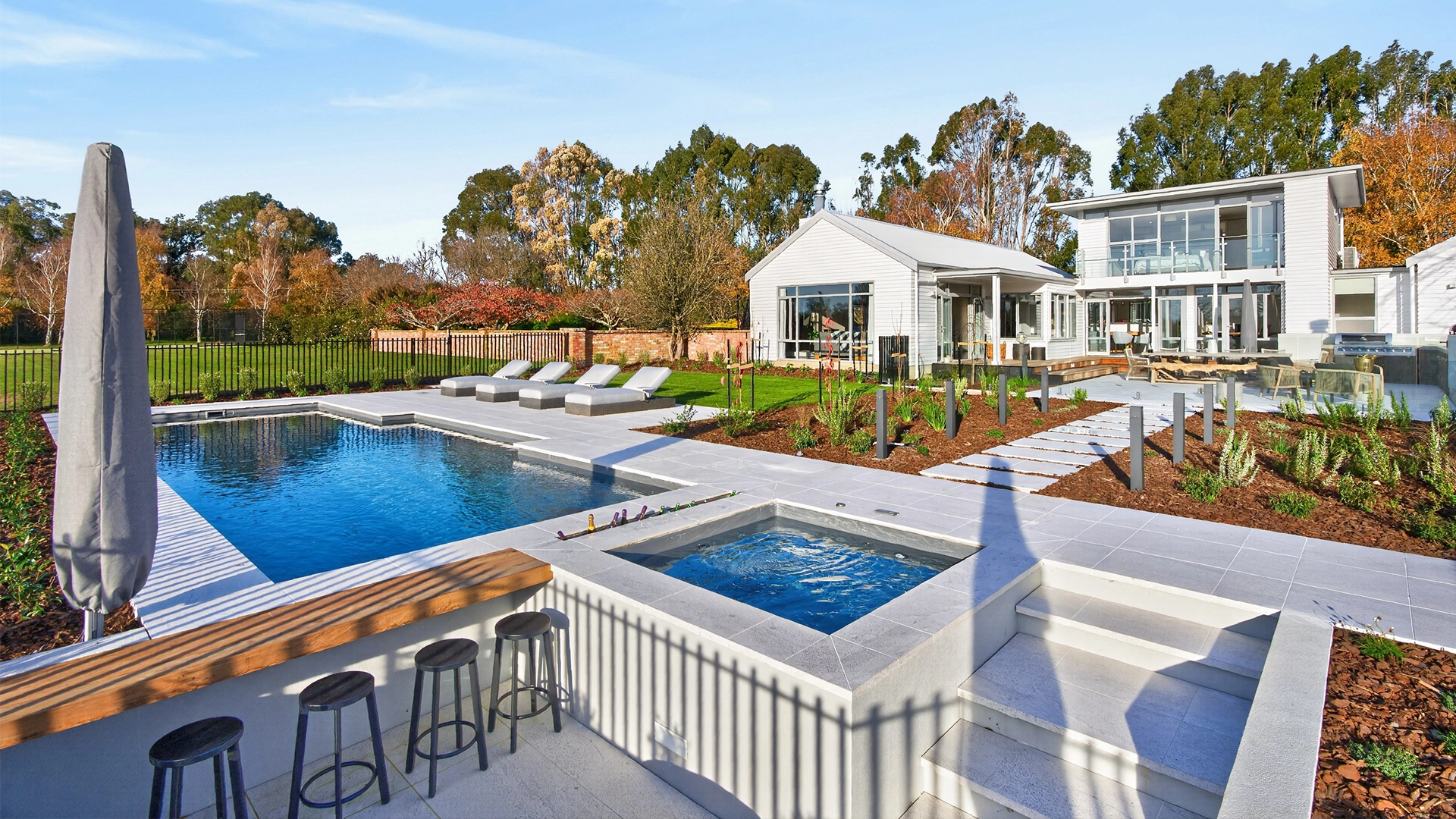 The Elegance 12.00m with The Amalfi Spa in Silver Grey installed by NZ Pools