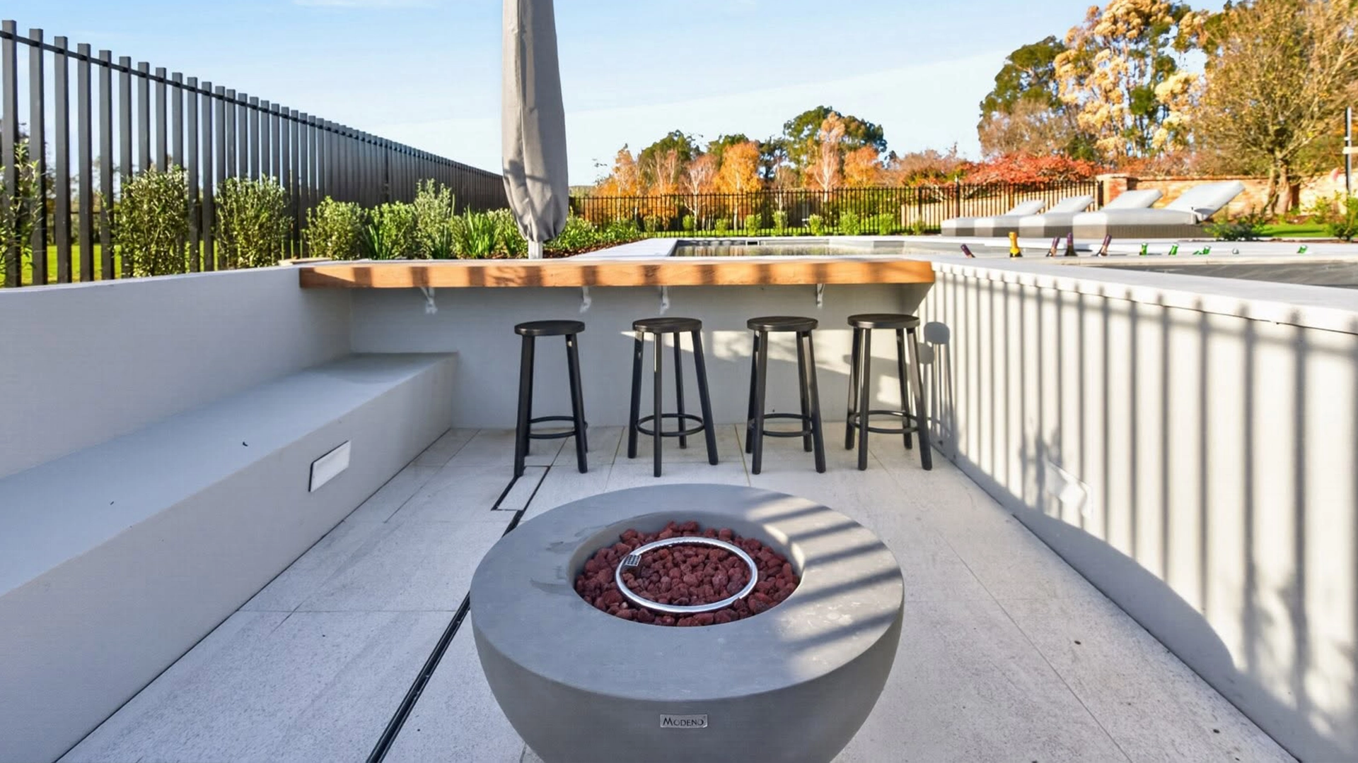 Sunken Firepit and Swim Up Bar with The Elegance 12.00m with The Amalfi Spa in Silver Grey installed by NZ Pools 