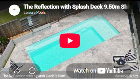 Elegant swimming pool with sun loungers.
