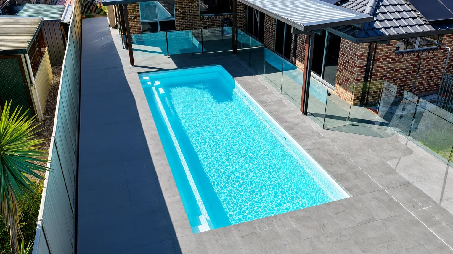The Reflection 10.00m in Shimmer White, installed by Pinnacle Pools, in Varsity Lakes, QLD The Reflection 10.00m in Shimmer White, installed by Pinnacle Pools, in Varsity Lakes, QLD